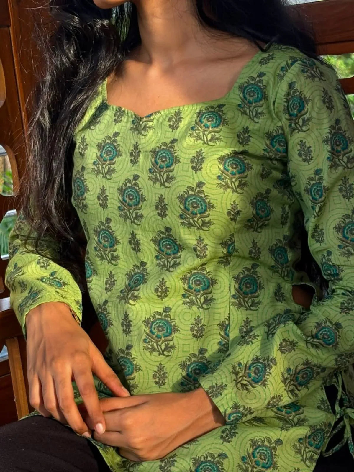 Close-up of the Olive Bloom Tieup Cotton Kurti showcasing the floral print and neckline by The Label Razi