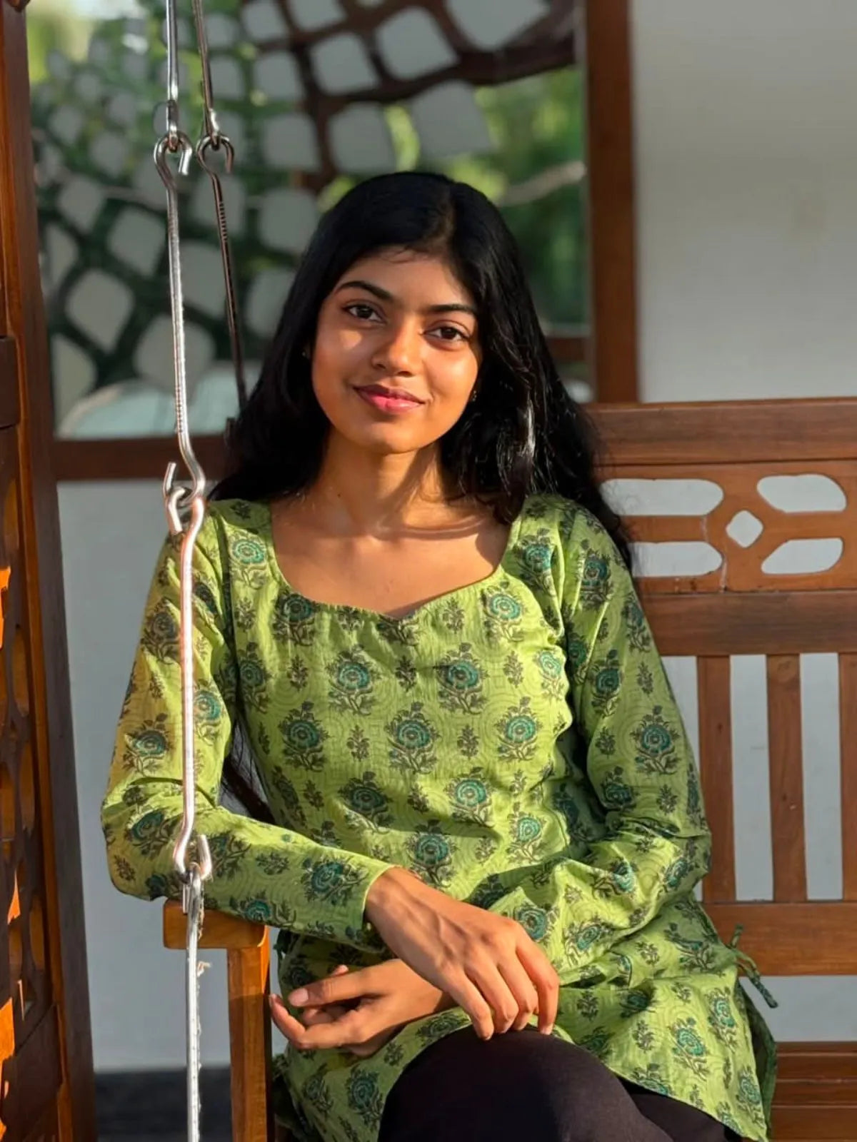 Model wearing the Olive Bloom Tieup Cotton Kurti in an outdoor setting by The Label Razi