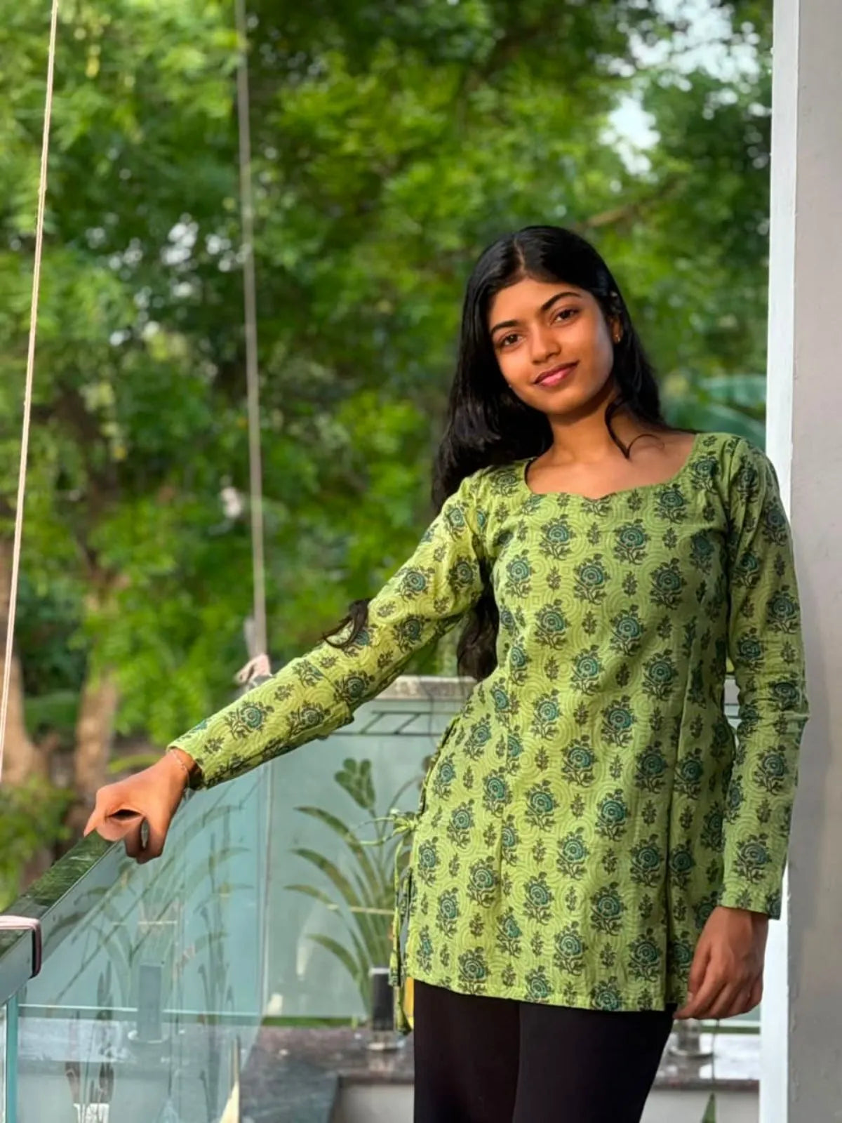 Model wearing the Olive Bloom Tieup Cotton Kurti by The Label Razi
